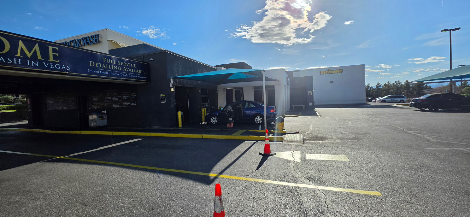 Lucky 7 Hand Car Wash full service detailing building with shaded work bays